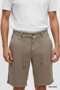 Man wearing Brango khaki cotton drawstring shorts made in Turkey, front view