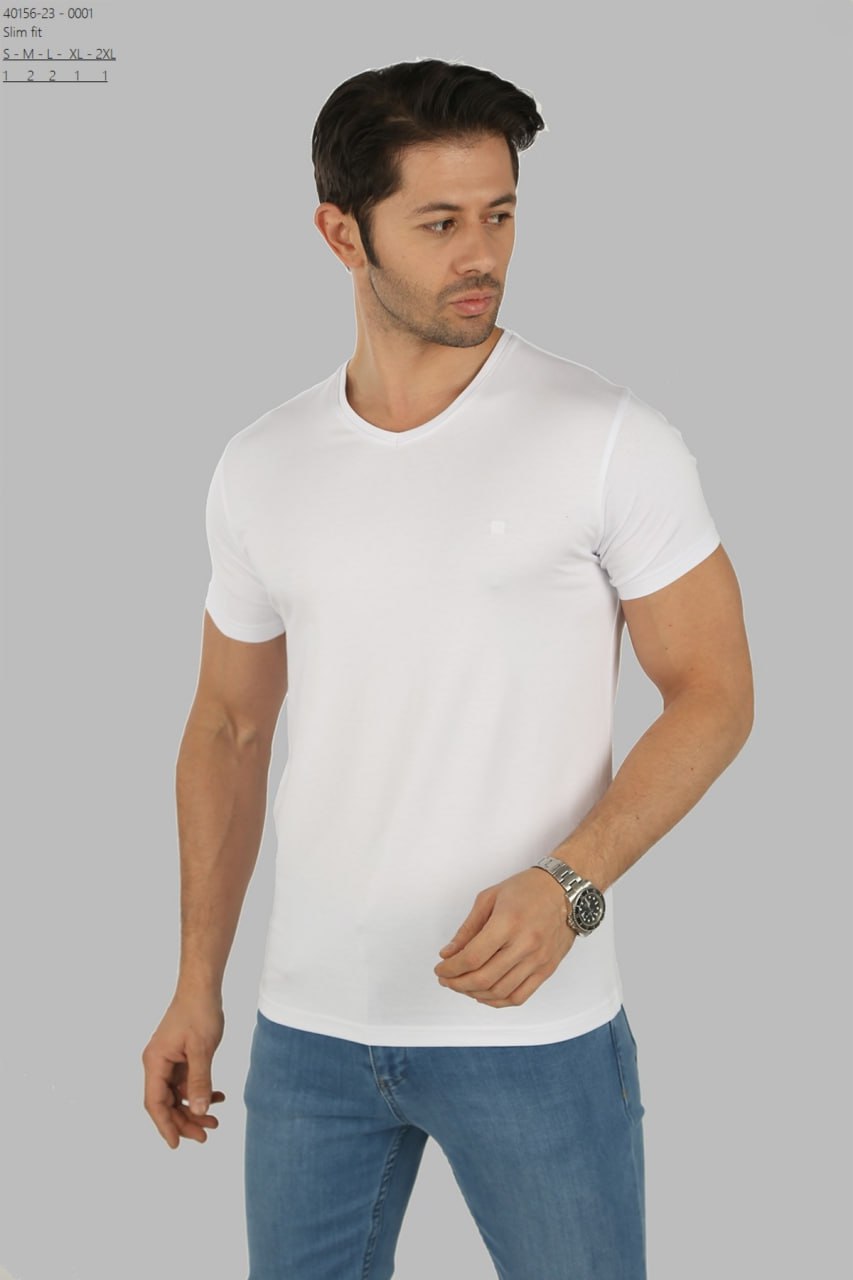 Male model wearing a fitted Brango premium white v-neck t-shirt paired with light blue denim jeans, imported from Türkiye.