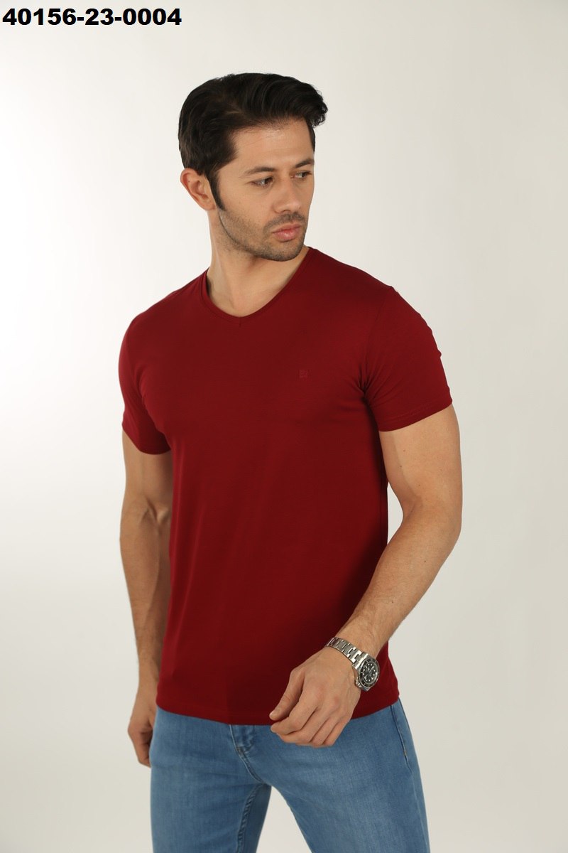 Male model wearing a fitted Brango premium rich maroon slim-fit v-neck t-shirt  paired with light blue denim jeans, imported from Türkiye.