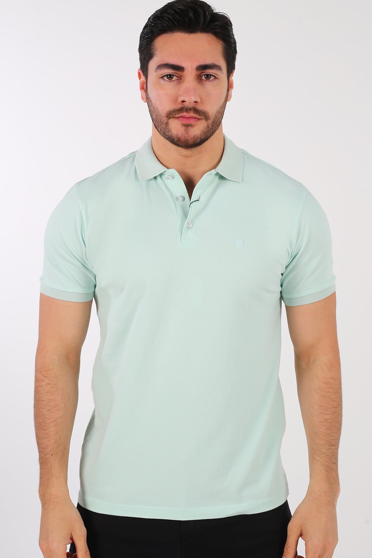 Premium Turkish apparel men's aqua green pique polo shirt with a sharp, tailored athletic drape.